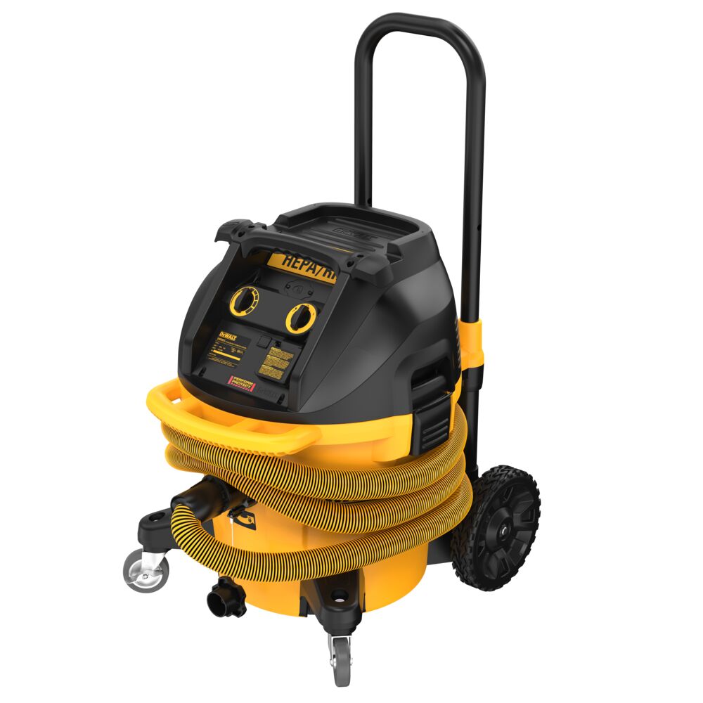 Dust extractor at an angle with the hose wrapped around the unit